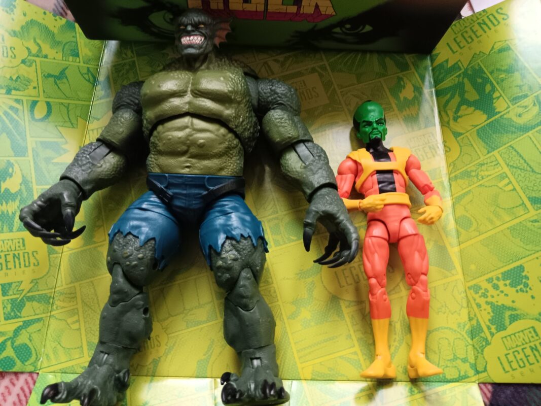 Abomination and Marvel Legends Leader figure standing side by side for size comparison.